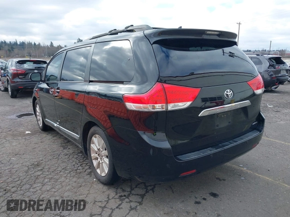 2011 Toyota Sienna XLE AAS with VIN 5TDYK3DC5BS141021, listed as a IAAI auction lot 41538641 with 127,805 mi miles and . Bid and sale history available at DreamBid. Image 3.