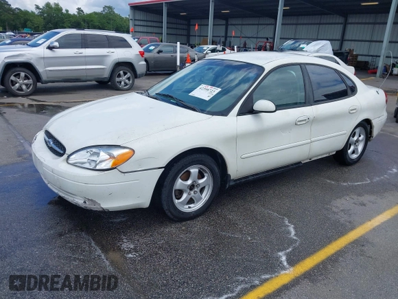 2003 Ford Taurus SE Standard with VIN 1FAFP53U13A192387, listed as a IAAI auction lot 42398723 with 247,077 mi miles and . Bid and sale history available at DreamBid. Image 2.