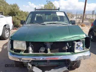 1998 Nissan Frontier XE z VIN 1N6DD26S3WC318614, wystawiony jako IAAI lot #41965202 z przebiegiem 107 786 mil mil oraz . Historia ofert i sprzedaży dostępna na DreamBid. Obrazek 13.