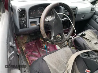 1995 Nissan Frontier SE z VIN 1N6HD16Y1SC324955, wystawiony jako Copart lot #42983295 z przebiegiem 266 320 mil mil oraz Szkoda całkowita • Salvage title. Historia ofert i sprzedaży dostępna na DreamBid. Obrazek 8.