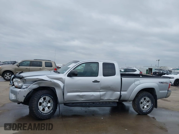 2013 Toyota Tacoma with VIN 5TFUU4EN1DX065356, listed as a IAAI auction lot 41509219 with 122,520 mi miles and . Bid and sale history available at DreamBid. Image 14.