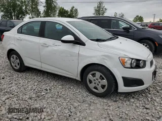 2015 Chevrolet Sonic LS with VIN 1G1JA5SH4F4165108, listed as a Copart auction lot 57299985 with 117,669 mi miles and Clean title. Bid and sale history available at DreamBid. Image 4.