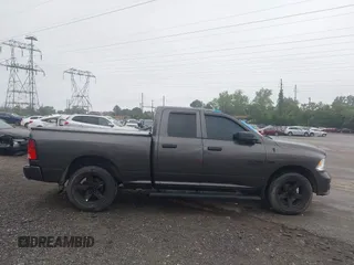 2015 Ram 1500 Express z VIN 1C6RR7FT4FS731476, wystawiony jako IAAI lot #42448640 z przebiegiem 104 713 mil mil oraz . Historia ofert i sprzedaży dostępna na DreamBid. Obrazek 13.