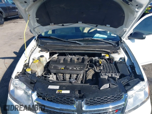 2014 Dodge Avenger SE z VIN 1C3CDZAB1EN116800, wystawiony jako IAAI lot #41668822 z przebiegiem 190 583 mil mil oraz . Historia ofert i sprzedaży dostępna na DreamBid. Obrazek 10.
