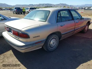 1995 Buick LeSabre Custom with VIN 1G4HP52LXSH541074, listed as a IAAI auction lot 41835035 with 101,026 mi miles. Bid and sale history available at carsss.com. Image 4.