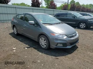 2013 Honda Insight z VIN JHMZE2H31DS000827, wystawiony jako Copart lot #60745645 z przebiegiem 172 694 mil mil oraz Szkoda całkowita • Salvage title. Historia ofert i sprzedaży dostępna na DreamBid. Obrazek 13.