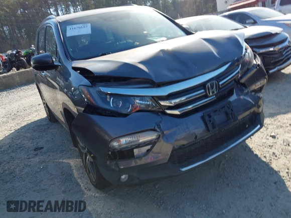 2016 Honda Pilot Elite with VIN 5FNYF6H01GB050555, listed as a IAAI auction lot 41670197 with 140,000 mi miles. Bid and sale history available at carsss.com. Image 17.