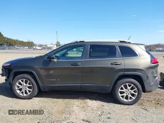 2014 Jeep Cherokee Latitude with VIN 1C4PJMCS5EW201462, listed as a IAAI auction lot 41727379 with 170,958 mi miles and . Bid and sale history available at DreamBid. Image 15.