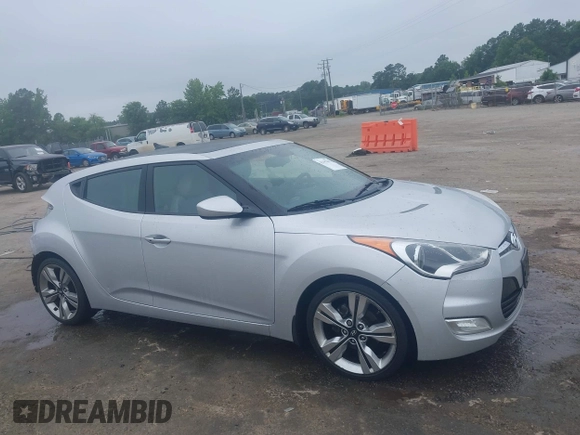 2012 Hyundai Veloster w/Black Int with VIN KMHTC6AD1CU034787, listed as a IAAI auction lot 42607847 with 126,912 mi miles and . Bid and sale history available at DreamBid. Image 14.