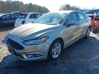 2018 Ford Fusion S z VIN 3FA6P0UU8JR271589, wystawiony jako IAAI lot #41318471 z przebiegiem 148 793 mil mil oraz . Historia ofert i sprzedaży dostępna na DreamBid. Obrazek 18.
