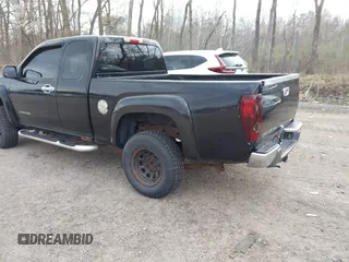 2005 GMC Canyon SLE Z85 with VIN 1GTDT196958206061, listed as a IAAI auction lot 42121015 with 158,440 mi miles. Bid and sale history available at carsss.com. Image 3.