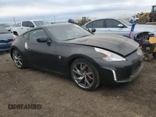 2014 Nissan 370Z Touring with VIN JN1AZ4EH2EM633814, listed as a Copart auction lot 84120274 with 22,979 mi miles and Salvage Title. Bid and sale history available at carsss.com. Image 4.