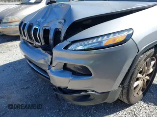 2016 Jeep Cherokee Limited with VIN 1C4PJLDB8GW239294, listed as a IAAI auction lot 41675712 with 140,491 mi miles. Bid and sale history available at carsss.com. Image 6.