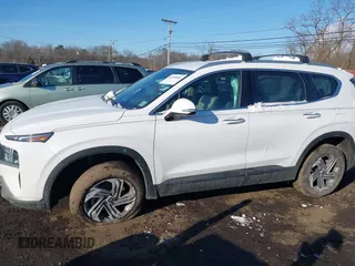2023 Hyundai Santa Fe SEL z VIN 5NMS2DAJ8PH640338, wystawiony jako IAAI lot #41394066 z przebiegiem 19 064 mil mil oraz . Historia ofert i sprzedaży dostępna na DreamBid. Obrazek 17.