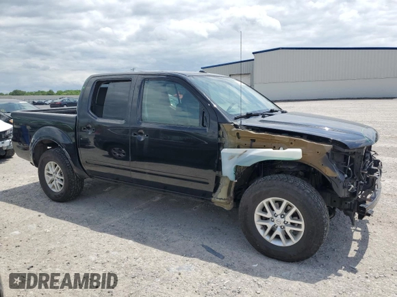 2018 Nissan Frontier SV with VIN 1N6AD0EV5JN745860, listed as a Copart auction lot 61404925 with 63,110 mi miles and Salvage title. Bid and sale history available at DreamBid. Image 4.