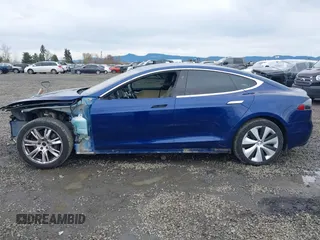 2017 Tesla Model S 100D with VIN 5YJSA1E25HF184502, listed as a IAAI auction lot 41834310 with 92,887 mi miles and . Bid and sale history available at DreamBid. Image 15.