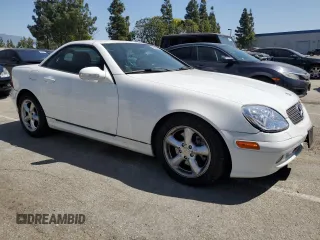 2001 Mercedes-Benz SLK-Class with VIN WDBKK65F81F210099, listed as a Copart auction lot 52606105 with 129,849 mi miles and Salvage Title. Bid and sale history available at carsss.com. Image 4.