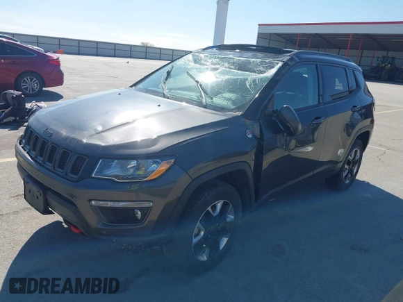 2019 Jeep Compass Trailhawk with VIN 3C4NJDDB0KT619337, listed as a IAAI auction lot 42171160 with 63,869 mi miles and . Bid and sale history available at DreamBid. Image 17.