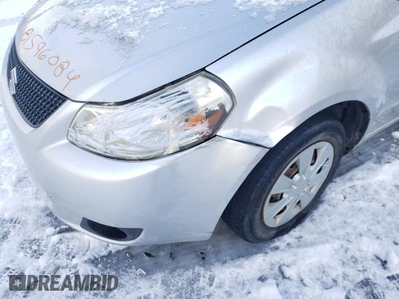 2010 Suzuki SX4 LE with VIN JS2YC5A25A6300970, listed as a Copart auction lot 81596084 with 142,083 mi miles and Salvage Title. Bid and sale history available at carsss.com. Image 12.