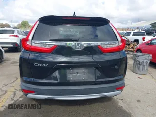 2017 Honda CR-V EX with VIN 7FARW1H55HE009693, listed as a IAAI auction lot 41539260 with 136,645 mi miles. Bid and sale history available at carsss.com. Image 16.