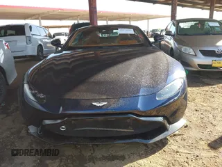 2019 Aston Martin Vantage z VIN SCFSMGAW3KGN00836, wystawiony jako IAAI lot #41974894 z przebiegiem 16 835 mil mil oraz . Historia ofert i sprzedaży dostępna na DreamBid. Obrazek 12.