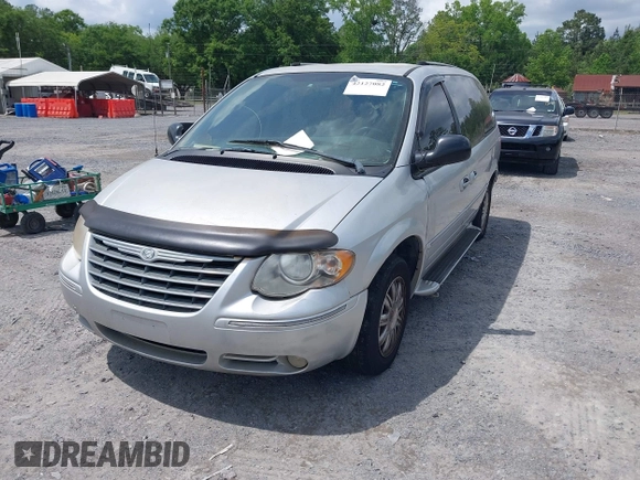 2006 Chrysler Town & Country LWB Limited with VIN 2A8GP64L26R797487, listed as a IAAI auction lot 42127082 with 126,548 mi miles. Bid and sale history available at carsss.com. Image 2.