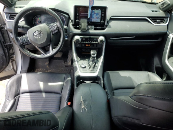 2021 Toyota RAV4 Hybrid XSE with VIN JTME6RFV4MJ008033, listed as a Copart auction lot 59039665 with 174,302 mi miles and Salvage title. Bid and sale history available at DreamBid. Image 8.