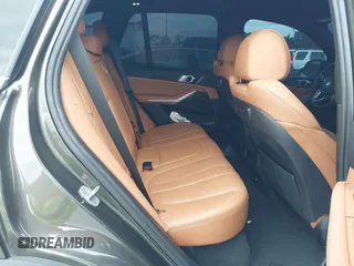 2022 BMW X5 xDrive45e z VIN 5UXTA6C00N9L06383, wystawiony jako IAAI lot #38552162 z przebiegiem 19 592 mil mil oraz . Historia ofert i sprzedaży dostępna na DreamBid. Obrazek 8.