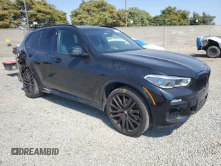 2021 BMW X5 sDrive40i with VIN 5UXCR4C00M9F54602, listed as a Copart auction lot 62417255 with 42,110 mi miles and Salvage title. Bid and sale history available at DreamBid. Image 4.