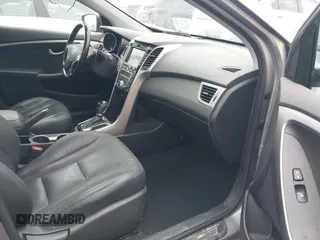 2013 Hyundai Elantra GT with VIN KMHD35LEXDU114448, listed as a IAAI auction lot 41944985 with 71,180 mi miles. Bid and sale history available at carsss.com. Image 5.