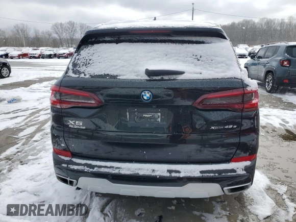 2023 BMW X5 xDrive45e with VIN 5UXTA6C08P9P28260, listed as a Copart auction lot 44729105 with 59,731 mi miles and Salvage Title. Bid and sale history available at carsss.com. Image 6.