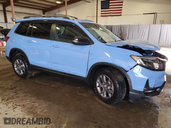 2024 Honda Passport TrailSport z VIN 5FNYF8H61RB013217, wystawiony jako Copart lot #52349015 z przebiegiem 8 360 mil mil oraz Szkoda całkowita • Salvage title. Historia ofert i sprzedaży dostępna na DreamBid. Obrazek 4.