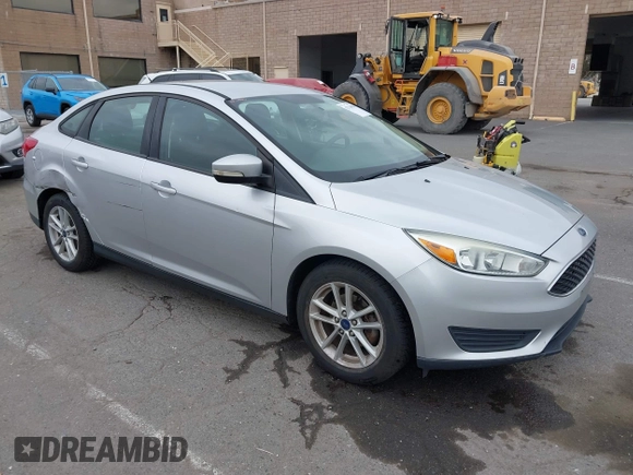 2015 Ford Focus SE z VIN 1FADP3F21FL218369, wystawiony jako IAAI lot #42126986 z przebiegiem 99 844 mil mil oraz . Historia ofert i sprzedaży dostępna na DreamBid. Obrazek 1.