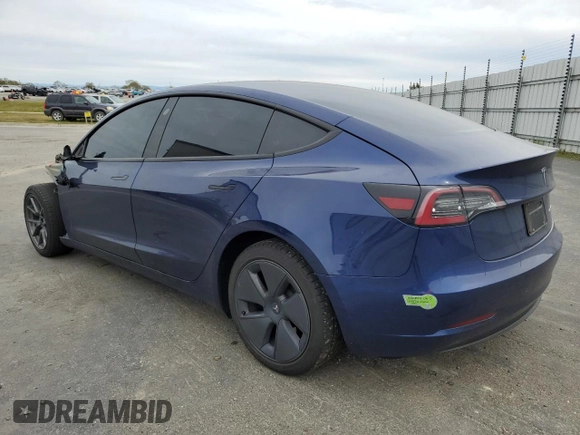 2023 Tesla Model 3 Long Range with VIN 5YJ3E1EB0PF388986, listed as a Copart auction lot 49823045 with 93,870 mi miles and Salvage Title. Bid and sale history available at DreamBid. Image 2.