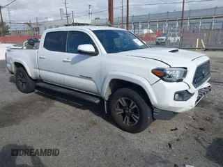 2018 Toyota Tacoma SR5 with VIN 3TMBZ5DN7JM016650, listed as a IAAI auction lot 41903835 with 105,123 mi miles and . Bid and sale history available at DreamBid. Image 1.