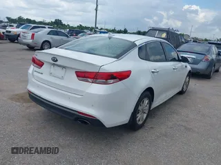 2018 Kia Optima S with VIN 5XXGT4L32JG184893, listed as a IAAI auction lot 42680521 with 55,225 mi miles and . Bid and sale history available at DreamBid. Image 4.
