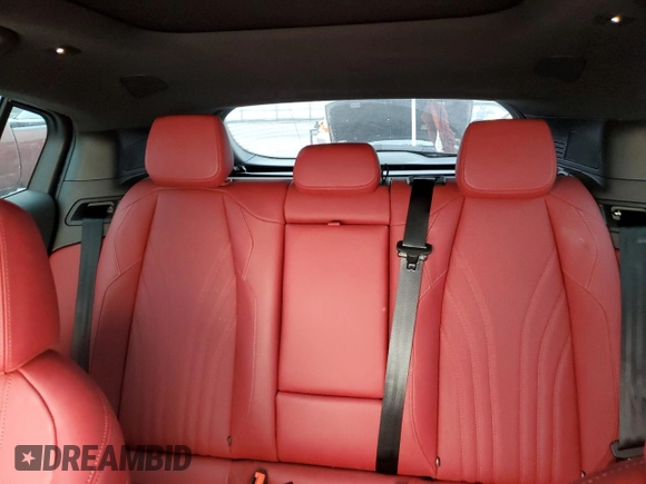 2023 Maserati Grecale Modena z VIN ZN682AVM0P7432182, wystawiony jako Copart lot #52376645 z przebiegiem 9 408 mil mil oraz Szkoda całkowita • Salvage title. Historia ofert i sprzedaży dostępna na DreamBid. Obrazek 10.