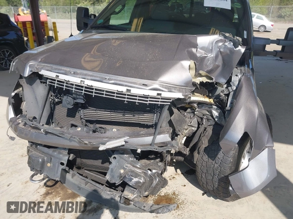 2014 Ford F-150 XL with VIN 1FTFW1ET5EFA77288, listed as a IAAI auction lot 42106634 with 74,582 mi miles. Bid and sale history available at carsss.com. Image 6.