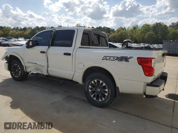 2019 Nissan Titan Pro-4X z VIN 1N6AA1E51KN526104, wystawiony jako Copart lot #51694335 z przebiegiem 56 620 mil mil oraz Szkoda całkowita • Salvage title. Historia ofert i sprzedaży dostępna na DreamBid. Obrazek 2.