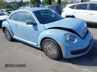 2013 Volkswagen Beetle with VIN 3VWHX7AT4DM667136, listed as a IAAI auction lot 41855778 with 120,300 mi miles and . Bid and sale history available at DreamBid. Image 1.