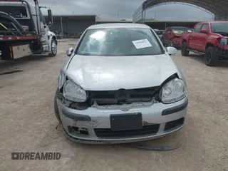 2006 Volkswagen Rabbit z VIN WVWBR71K36W194312, wystawiony jako IAAI lot #42026843 z przebiegiem 89 712 mil mil oraz . Historia ofert i sprzedaży dostępna na DreamBid. Obrazek 13.