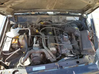 1998 Jeep Cherokee Sport with VIN 1J4FT68S9WL141631, listed as a Copart auction lot 68974974 with 0 mi miles and Salvage Title. Bid and sale history available at carsss.com. Image 13.