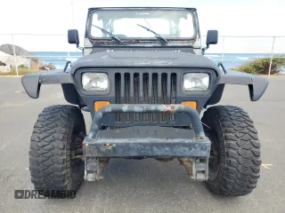 1990 Jeep Wrangler with VIN 2J4FY29T5LJ537896, listed as a Copart auction lot 57021295 with 143,753 mi miles and Clean title. Bid and sale history available at DreamBid. Image 5.