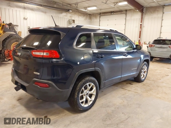 2014 Jeep Cherokee Latitude with VIN 1C4PJMCS9EW239549, listed as a IAAI auction lot 41156954 with 167,331 mi miles and . Bid and sale history available at DreamBid. Image 4.
