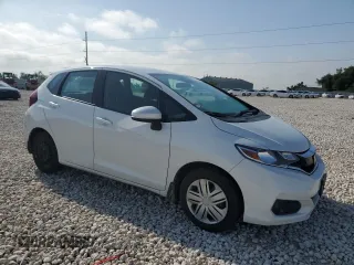 2019 Honda Fit LX with VIN 3HGGK5H48KM737557, listed as a Copart auction lot 55716935 with 123,210 mi miles and Salvage title. Bid and sale history available at DreamBid. Image 4.