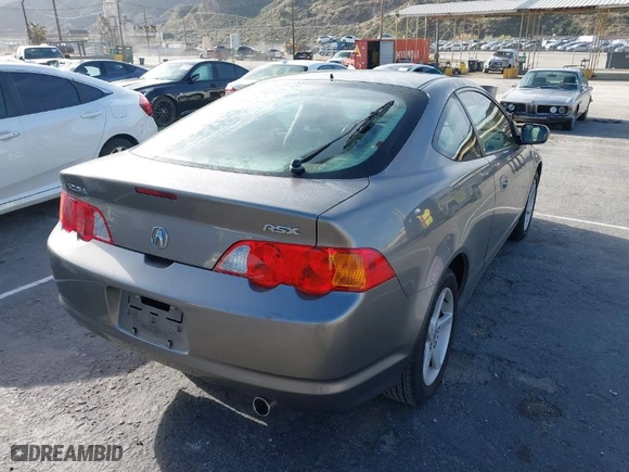 2003 Acura RSX with VIN JH4DC54823S004693, listed as a IAAI auction lot 41768940 with 31,265 mi miles. Bid and sale history available at carsss.com. Image 4.
