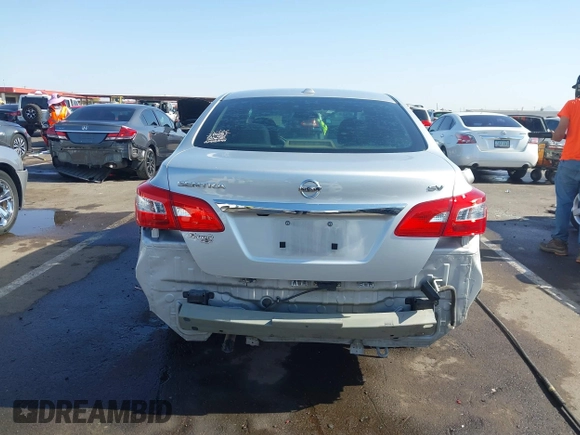 2017 Nissan Sentra S z VIN 3N1AB7AP9HY277592, wystawiony jako IAAI lot #42287903 z przebiegiem 186 876 mil mil oraz . Historia ofert i sprzedaży dostępna na DreamBid. Obrazek 17.