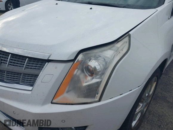 2011 Cadillac SRX Performance Collection with VIN 3GYFNBEY7BS585753, listed as a IAAI auction lot 42114525 with 233,329 mi miles and . Bid and sale history available at carsss.com. Image 6.