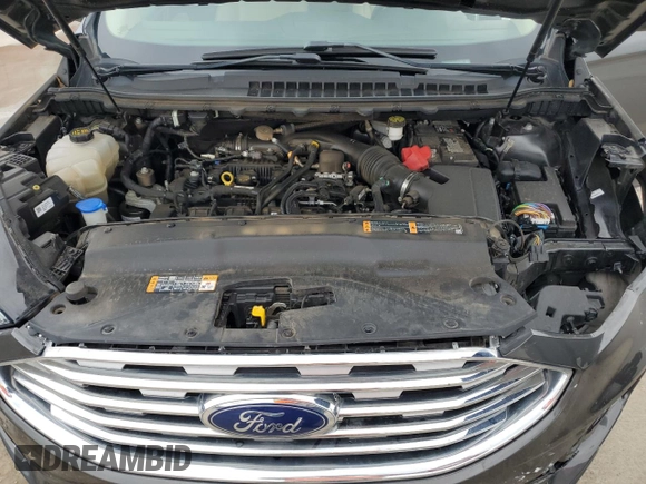 2019 Ford Edge SEL z VIN 2FMPK4J92KBB21770, wystawiony jako Copart lot #56056585 z przebiegiem 64 042 mil mil oraz Szkoda całkowita • Salvage title. Historia ofert i sprzedaży dostępna na DreamBid. Obrazek 12.