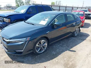 2018 Honda Clarity Touring z VIN JHMZC5F32JC001730, wystawiony jako IAAI lot #41718456 z przebiegiem 64 619 mil mil oraz . Historia ofert i sprzedaży dostępna na DreamBid. Obrazek 2.